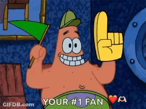 Patrick Star From Spongebob Is Wearing A Green Flag And Holding A Yellow Foam Finger GIF