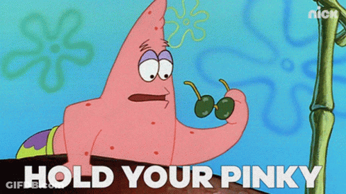 Patrick Star From Spongebob Squarepants Holding A Cherry GIF