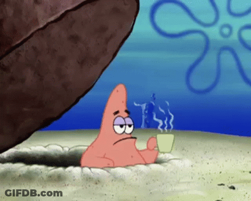 Patrick Star From Spongebob Squarepants Is Holding A Cup Of Coffee While Sitting In A Hole In The Sand . GIF