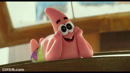 Patrick Star From Spongebob Squarepants Is Laying On A Table With His Hands On His Face GIF