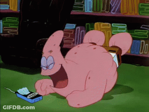 Patrick Star From Spongebob Squarepants Is Laying On The Floor Looking At A Phone GIF