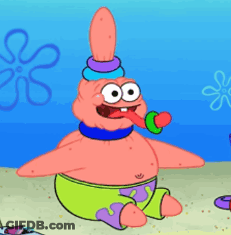 Patrick Star From Spongebob Squarepants Is Sitting On The Beach With His Tongue Out GIF