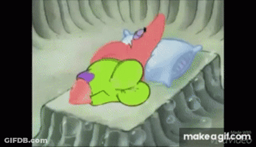 Patrick Star From Spongebob Squarepants Is Sleeping On A Bed With Pillows . GIF