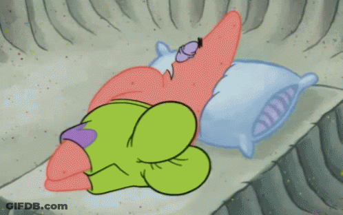 Patrick Star From Spongebob Squarepants Is Sleeping On A Bed With Two Pillows . GIF