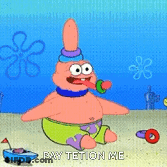 Patrick Star Sitting On Beach With Toy In Mouth GIF