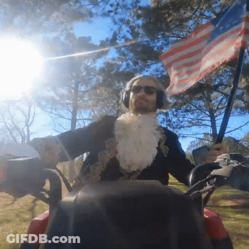 Patriotic Guy Rides A Quad GIF