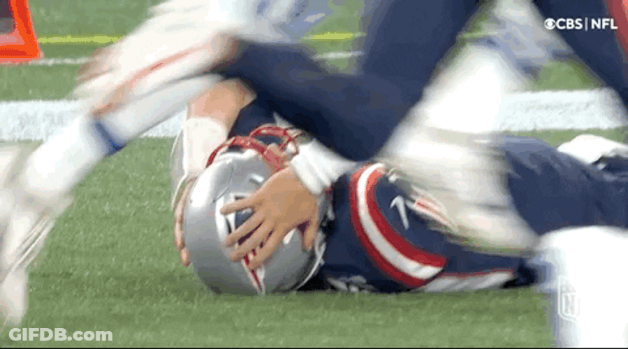 Patriots Mac Jones Laying Down In The Field GIF