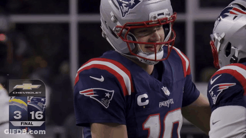 Patriots Player In Helmet Talking To Another Player GIF