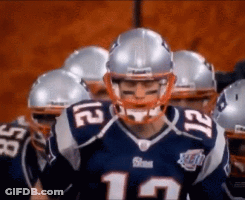 Patriots Players In Huddle With Helmets GIF