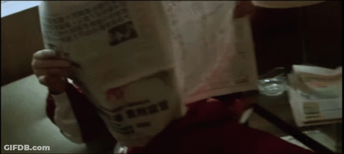 Paulie Walnuts Reading Newspaper GIF