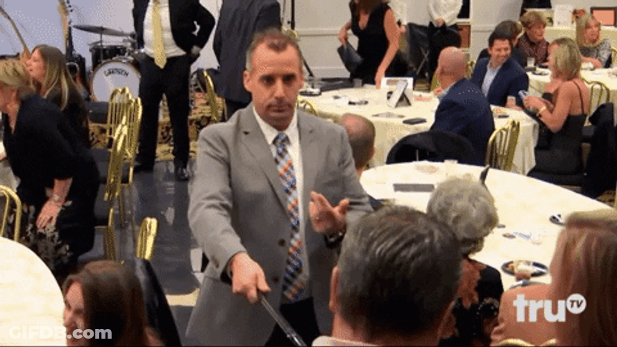 Pay Up Man At An Event GIF