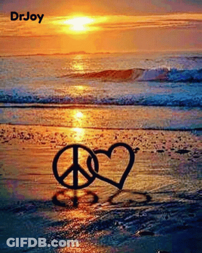 Peace Sign And Heart In Sand On Beach GIF
