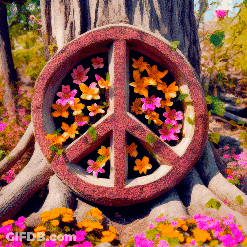 Peace Sign Surrounded By Flowers And Leaves GIF