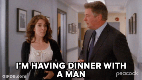 Peacock Ad Man And Woman Talking In Hallway GIF