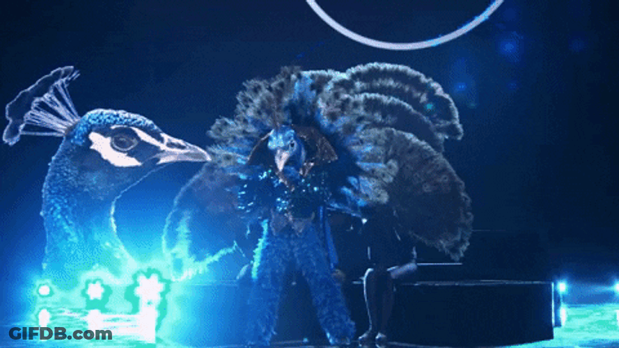 Peacock Performance Masked Singer GIF
