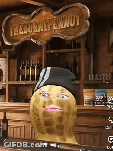 Peanut In Black Hat By The Burnt Peanut Sign GIF