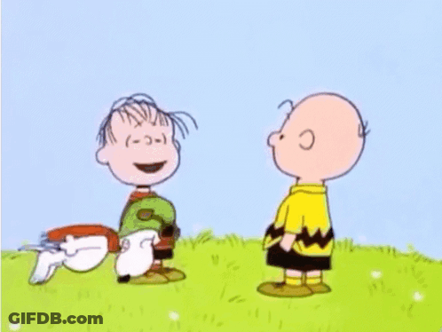 Peanuts Characters Playing In Grass With Dog GIF