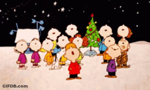 Peanuts Characters Singing Christmas Carols In Snow GIF