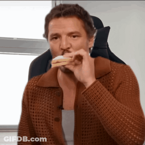 Pedro Pascal Eating Sandwich Joyfully GIF