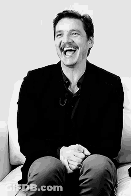 Pedro Pascal Happy Laughing Black Suit GIF