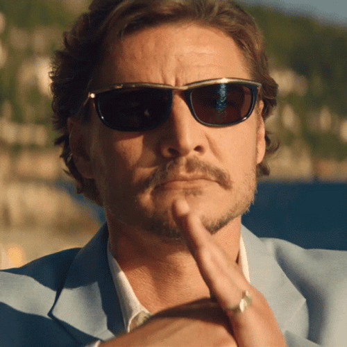 Pedro Pascal Nicolas Cage Nodding With Shades GIF