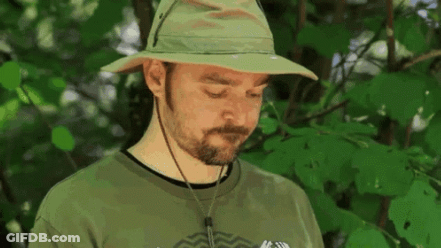 Pee Trying To Shoot In A Tumbler GIF
