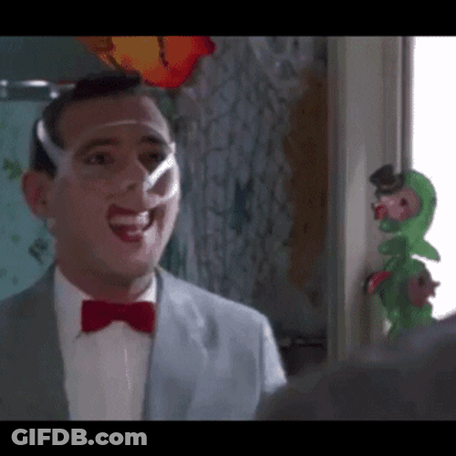 Pee Wee Herman Taping His Face GIF