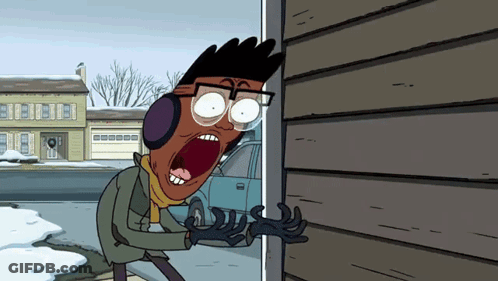 Peeking Cartoon Character With Glasses And Ear Muffs In Doorway GIF
