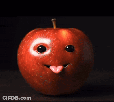 Peeled Apple With Knife Sticking Through GIF