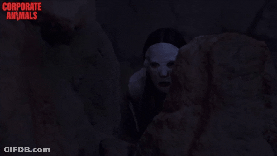 Peeping Tom Masked Man Hiding Behind Rock GIF