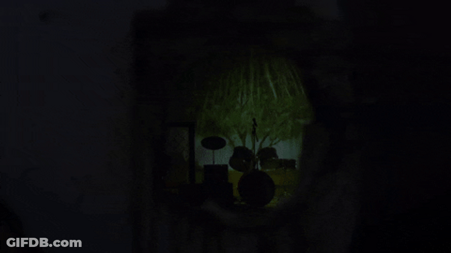 Peeping Tom Snooping Behind Door Loop GIF