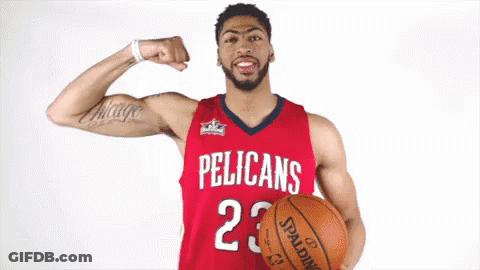 Pelican Basketball Player Flexing Muscles Holding Spalding Basketball GIF