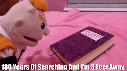 Penelope's Diary On Bed Next To Stuffed Animal GIF