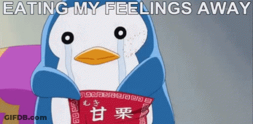 Penguin Crying Holding Food Saying Eating My Feelings Away GIF