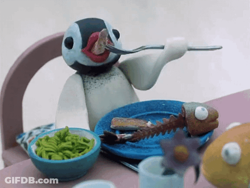 Penguin Holding Fork And Eating Meat GIF