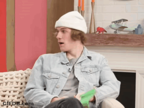 Penguin Holding Green Flag GIF