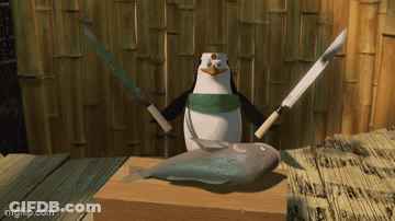 Penguin Holding Knives And Fish On Cutting Board GIF