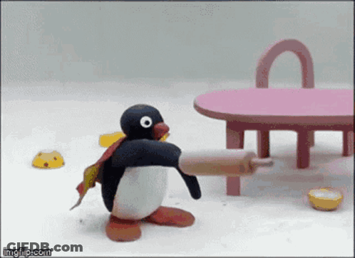 Penguin Holding Rolling Pin GIF