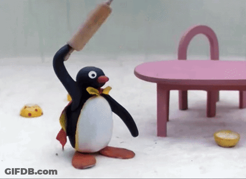 Penguin Holding Rolling Pin GIF
