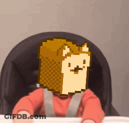 Penguin In Headband And Scarf Holding Cat On Blue Couch GIF