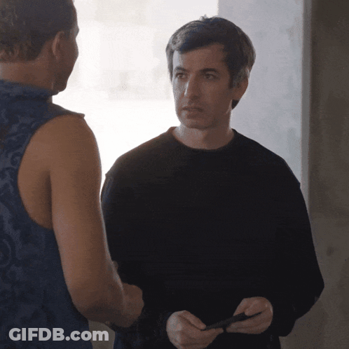 Penguin In Red Bandana And Tie Looking Through Binoculars GIF