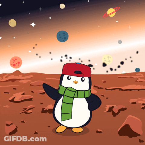 Penguin In Red Hat And Green Scarf On Rocky Planet GIF