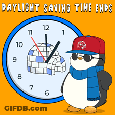 Penguin In Red Hat And Scarf Before Clock Saying Daylight Saving Time Ends GIF