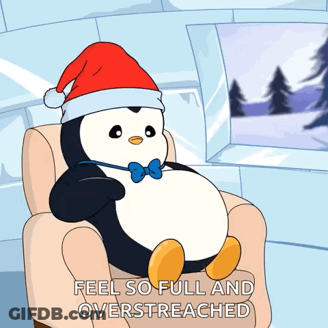 Penguin In Santa Hat And Bow Tie GIF
