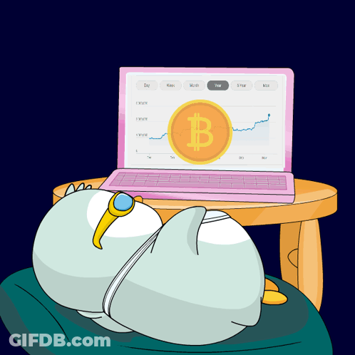 Penguin Laying In Front Of Laptop With Gold Coin Letter B GIF