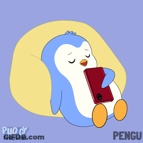 Penguin Laying On Pillow Looking At Red Cell Phone GIF