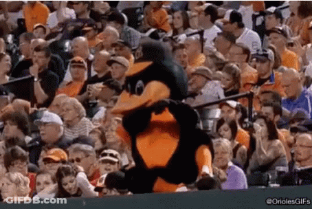 Penguin Mascot Dancing At Baseball Game GIF