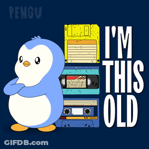 Penguin Next To Stack Of Cassette Tapes Saying I'm This Old GIF