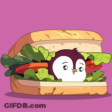 Penguin Peeking Out Of Sandwich With Lettuce Tomatoes And Cheese GIF