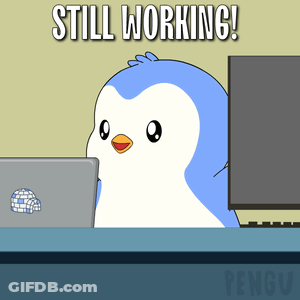 Penguin Sitting At Desk With Laptop Saying Still Working GIF